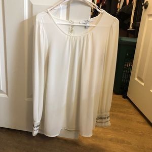 Blouse with sleeve embellishments